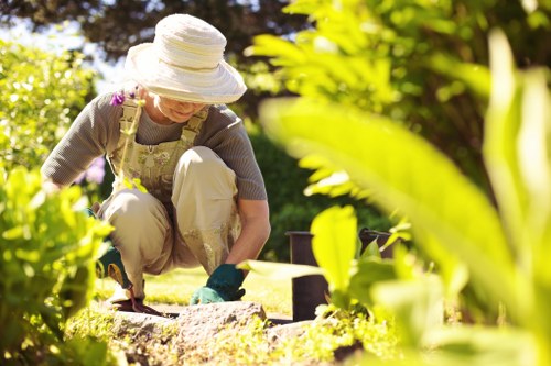 Team of gardeners planting seasonal flowers in Finsbury Park