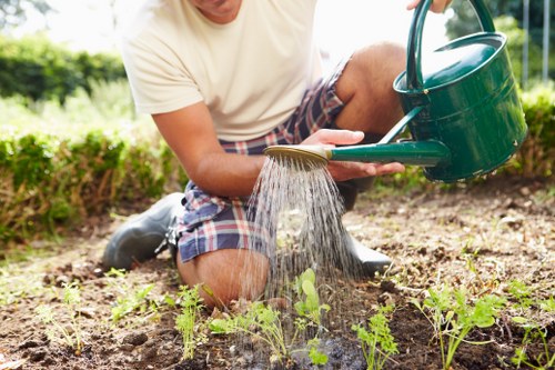Gardener in Finsbury Park working on a community green space